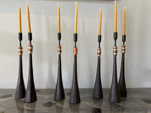 solid iron candlesticks with gold silver copper accents and no drip beeswax candles